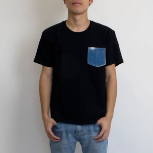 Black T-Shirt with Jean Pocket. Destroyed Ripped Denim Pocket in Indigo Blue. Man's Premium Cotton Tshirt. Classic Regular Fit. Unisex